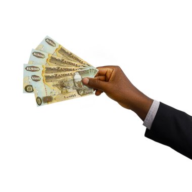 Black hand with suit holding 3D rendered Zambian kwacha notes isolated on white background
