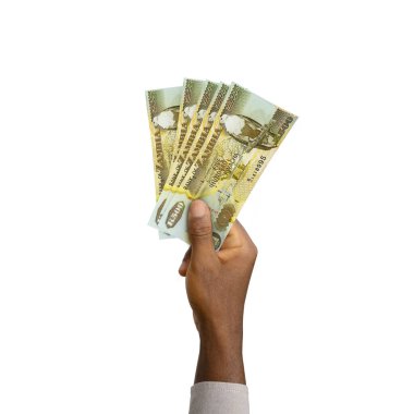 Kara El 'in elinde 3 boyutlu Zambiya yapımı kwacha notları var