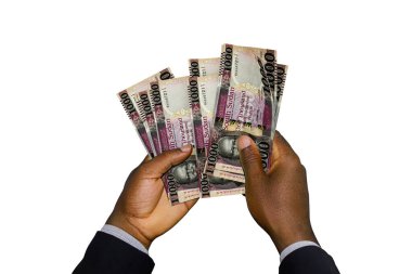 Black Hands in suit holding 3D rendered South Sudanese pound notes