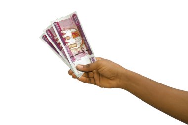 Fair hand holding 3D rendered 5000 Myanmar kyat notes isolated on white background