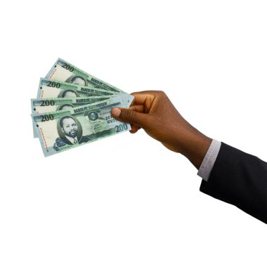 Black Hand with suit holding 3D rendered 200 Mozambican metical notes isolated on white background