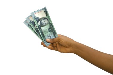 Fair hand holding 3D rendered Mozambican metical notes isolated on white background