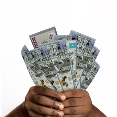 Black hands holding 3D rendered 20000 Kazakhstani notes. closeup of Hands holding Kazakhstani currency notes