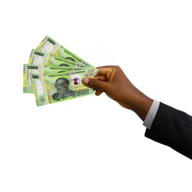 Black hand with suit holding 3D rendered Angolan Kwanza notes isolated on white background
