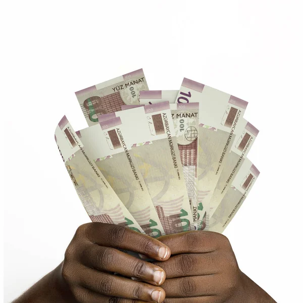 3D 'yi tutan eller 100 adet Azerbaycan Manat notası hazırladı. Azerbaycan para birimi notlarını tutan Eller 'e yakın çekim