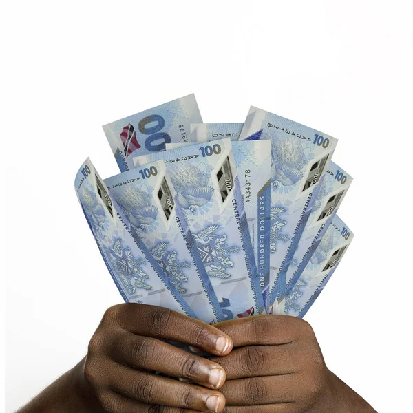 hands holding 3D rendered Trinidad and Tobago dollar. closeup of Hands holding Trinidad and Tobago currency notes