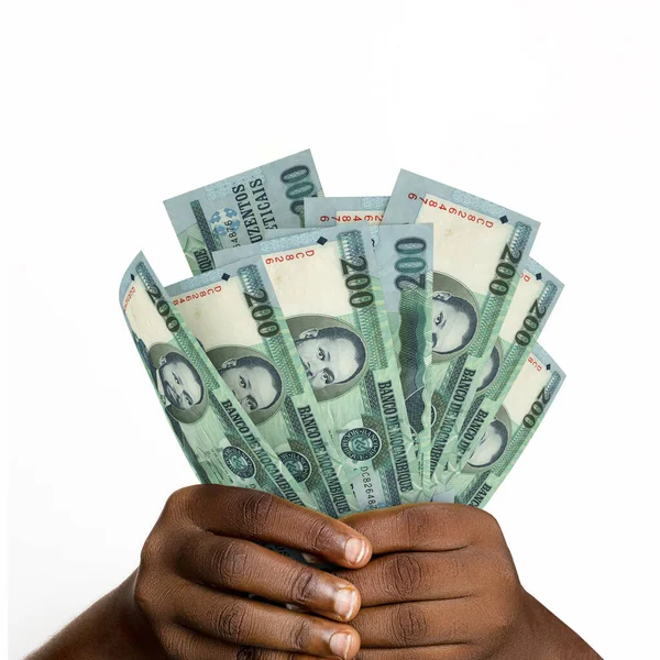Black hands holding 3D rendered 200 Mozambican metical notes. closeup of Hands holding Mozambican currency notes