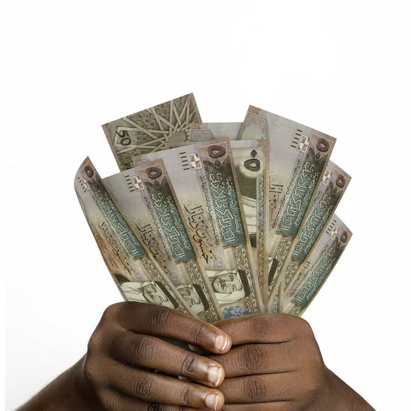 Üç boyutlu siyah eller, 50 Ürdün dinarı eder. Eller Ürdün para birimini tutarken yakın plan