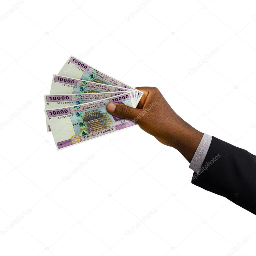 Black hand with suit holding 3D rendered 10000 Central African CFA franc notes isolated on white background