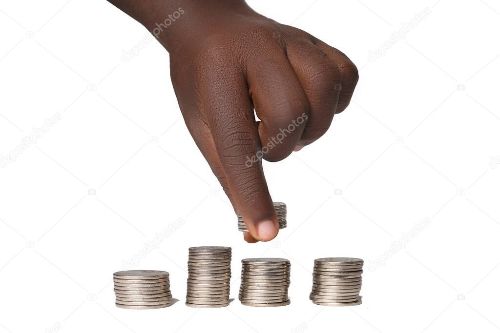 Black hand counting coins isolated on white background