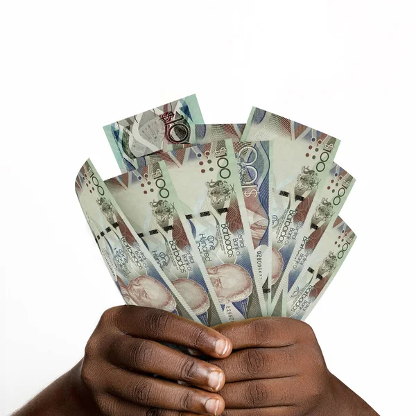 Black hands holding 3D rendered Barbados dollar closeup of Hands holding Barbadian currency notes