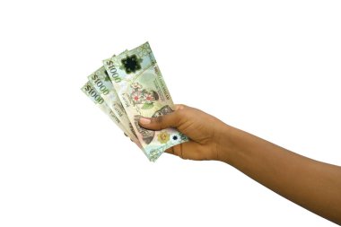 3D beyaz arka planda izole edilmiş 1000 Brunei dolarlık banknotlar.