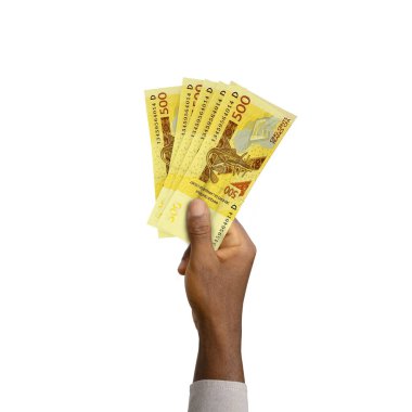 Black Hand holding 3D rendered CFA FRANC notes. Beninese, Burkinabe, Bissau-Guinean, Ivorian, Malian, Nigerien, Senegalese, Togolese