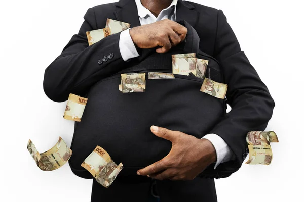Black Businessman Holding Black Bag Full Kenyan Shilling Notes Isolated — Stockfoto