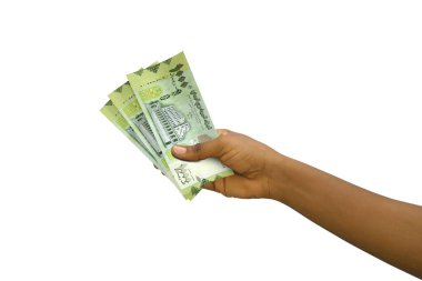 Fair hand holding 3D rendered Yemeni rial notes isolated on white background