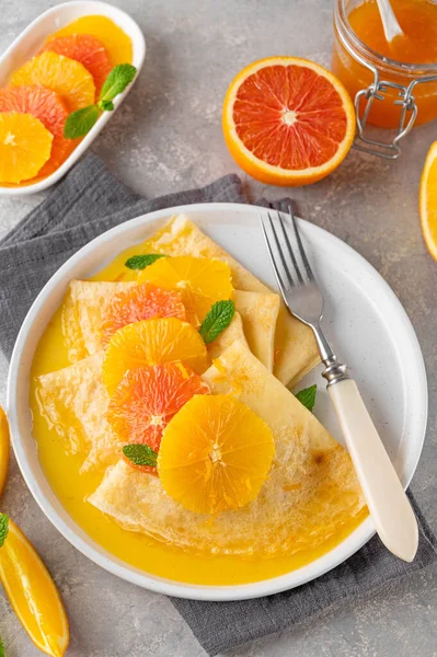 Delicious Crepes Suzette Orange Syrup Slices Fruits Plate Gray Concrete — Stock Photo, Image