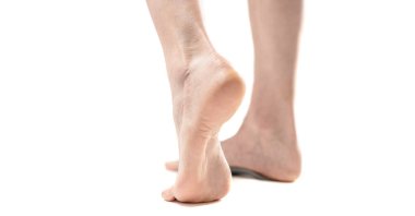 partial view of beautiful female legs, barefoot woman 