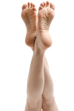 partial view of beautiful female legs, barefoot woman 