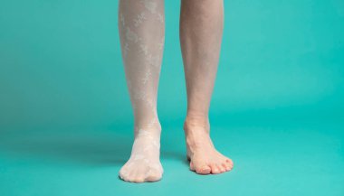 female legs, adult woman wearing white nylon stockings