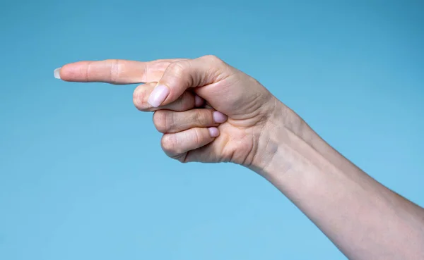 Cropped Image Female Hand Pointing Finger Left Side Imagem De Stock