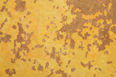 Yaşlanmış turuncu kahverengi kabuk soyma ve solmuş beton yüzeydeki çizikler. Duyguların erozyonu ve tutkusu Endüstriyel arka plan veya duvar kağıdı.