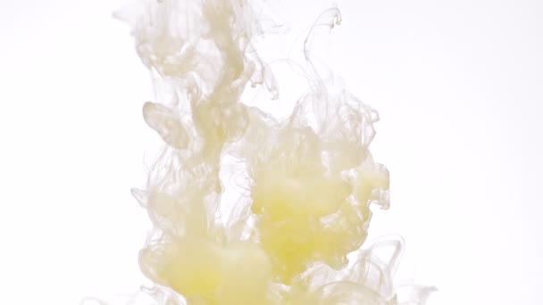 Swirls of cream yellow paint — Stock Video