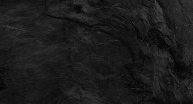 Fotokopi alanı olan koyu gri taş arka plan. Taş desenli siyah grunge pankartı. Taş duvarın dokusu..