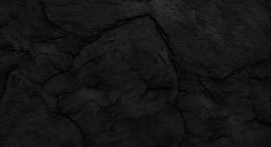 Fotokopi alanı olan koyu gri taş arka plan. Taş desenli siyah grunge pankartı. Taş duvarın dokusu..