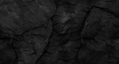 Fotokopi alanı olan koyu gri taş arka plan. Taş desenli siyah grunge pankartı. Taş duvarın dokusu..