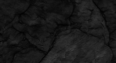 Fotokopi alanı olan koyu gri taş arka plan. Taş desenli siyah grunge pankartı. Taş duvarın dokusu..