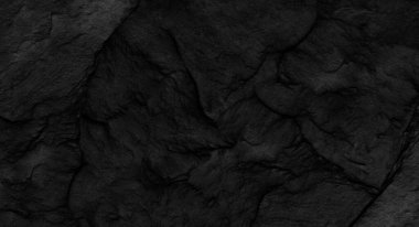 Fotokopi alanı olan koyu gri taş arka plan. Taş desenli siyah grunge pankartı. Taş duvarın dokusu..