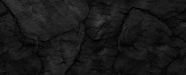 Fotokopi alanı olan koyu gri arkaplan. Taş desenli siyah grunge pankartı. Taş duvarın dokusu..