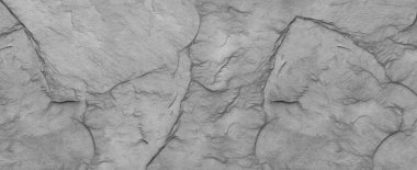 Panorama soyut taş arka planı. Taş duvarın dokusu. Yakın plan. Açık gri kaya arkaplanı.