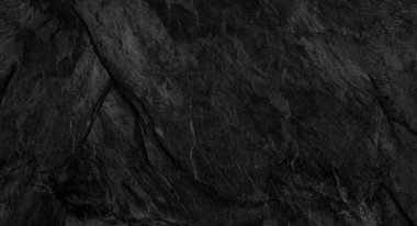 Fotokopi alanı olan koyu gri taş arka plan. Taş desenli siyah grunge pankartı. Taş duvarın dokusu..