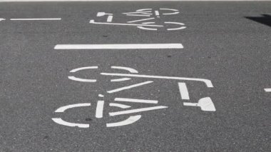close up of pictograms on a bike highway