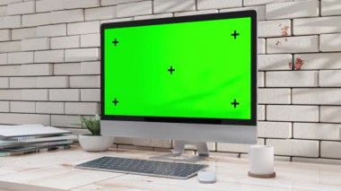 Ofisteki çalışma masasında asgari düzeyde tasarlanmış bir bilgisayar. Eğitim ve iş için kullanılabilir. Pankart ve logo için yeşil ekran. Canlandırma, 3B Hazırlama.