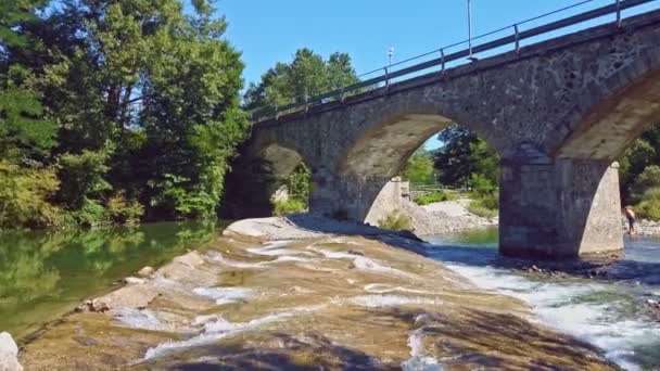 Bridge river clear water old viaduct overpass car panning horizontal background — Stock Video