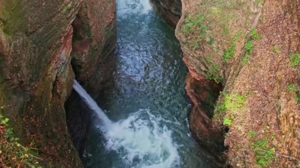 Canyon river narrow rock colorful beautiful orange no people vertical background Ravine Orrido of Ponte Alto in Trento - region Trentino Italy — Vídeo de Stock