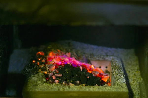 Burning coal coals in a coal boiler burner — стоковое фото