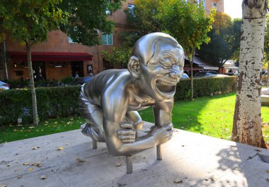 Yerevan, Armenia - October 15, 2021. Statue of Silver laughing boy near Cascade in Yerevan