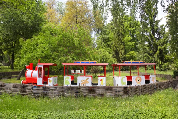 Red train for kids in Zoological garden in Kyiv, Ukraine