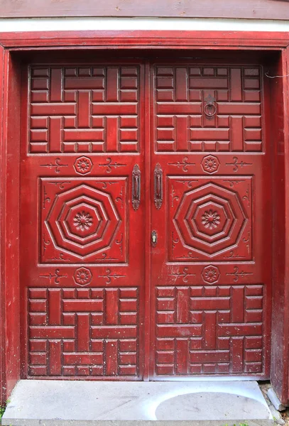 Beautiful Red Wooden Door Cavering Royalty Free Stock Photos