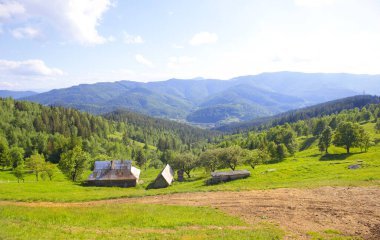 Panorama with wooden houses on Mount Makovitsa in Yaremche, Ukraine