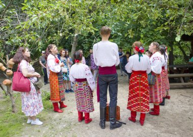 Ukrainian National Folk Vocal Ensemble sings in Cossack village (museum) Mamaeva Sloboda in Kyiv, Ukraine