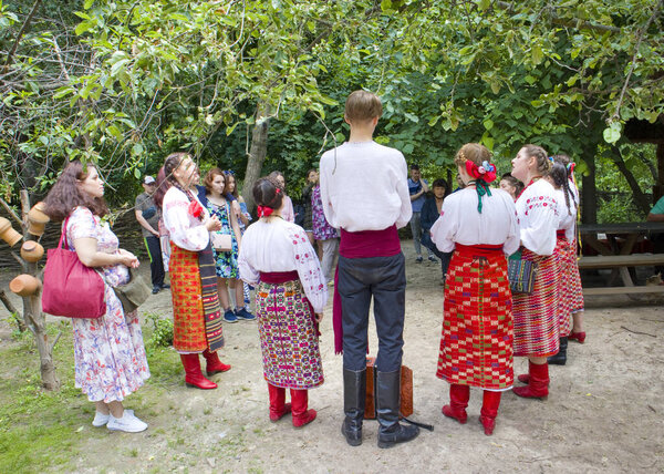 Ukrainian National Folk Vocal Ensemble sings in Cossack village (museum) Mamaeva Sloboda in Kyiv, Ukraine
