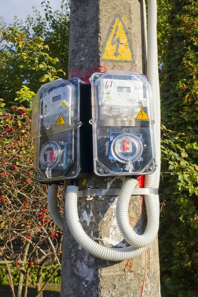 Electricity meter on a pole on the street