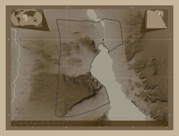 As Suways, governorate of Egypt. Elevation map colored in sepia tones with lakes and rivers. Locations of major cities of the region. Corner auxiliary location maps