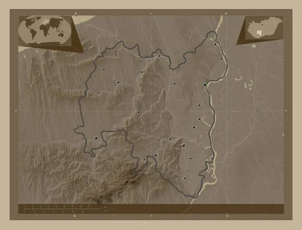 Tolna, county of Hungary. Elevation map colored in sepia tones with lakes and rivers. Locations of major cities of the region. Corner auxiliary location maps