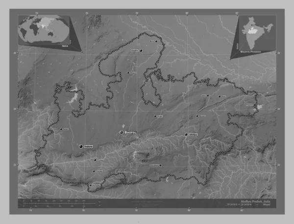 Madhya Pradesh, state of India. Grayscale elevation map with lakes and rivers. Locations and names of major cities of the region. Corner auxiliary location maps
