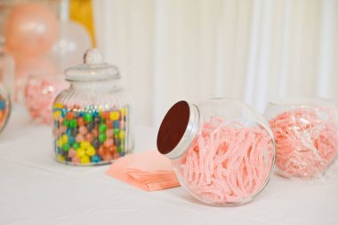 Composition with many candies on table indoor with copy space